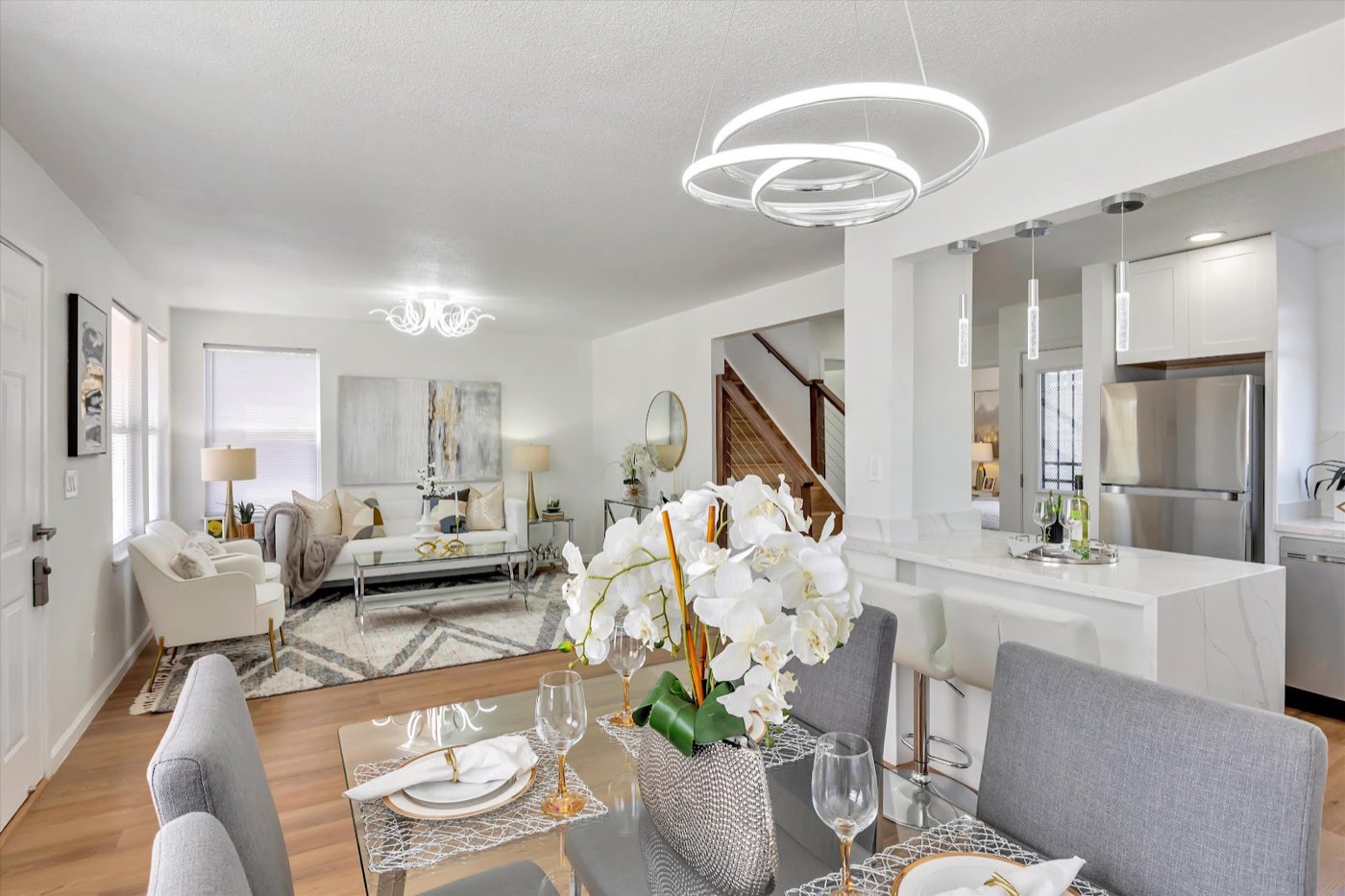 Remodeled living and dining room with new kitchen and staircase